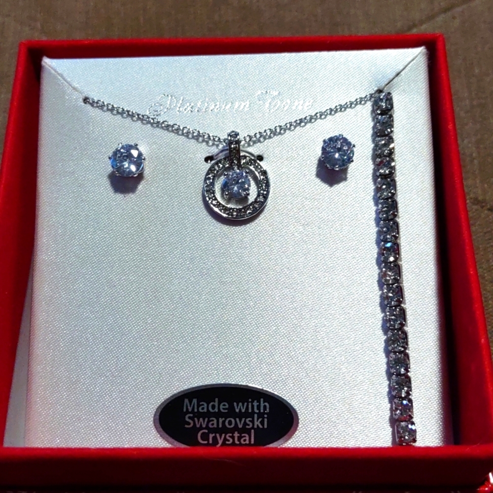 Earrings, necklace and bracelet, Swarovski crystal. New in box